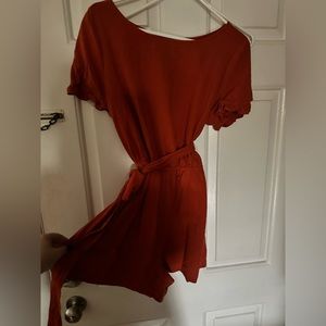 SHEIN- women’s orange short jumpsuit. Backless. No pockets. Adjustable belt.